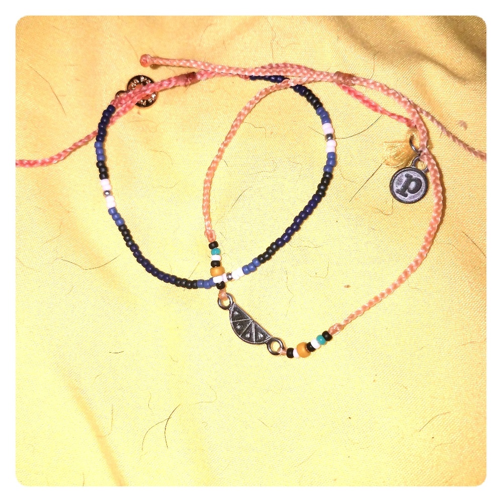 Navy seabead new release, with peach citrus charm